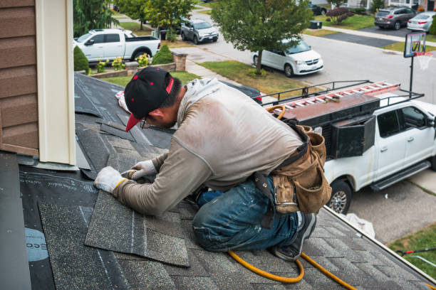 Professional Roofing technician working in Slatersville, RI